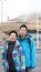 Asian son take senior mother to travel together family bond