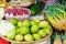 Asian street market selling chayote garlic cabbage and zucchini
