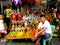 Asian street vendor selling different religious items outside of quiapo church in quiapo, manila, philippines in asia