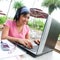 Asian student using her notebook computer