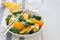 Asian style healthy spinach, avocado and orange salad with ginger-vinegar dressing, copy space