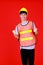 Asian supervisor foreman wearing safety suit and safety helmet standing look at camera with smiling feel happy and confident