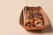 Asian sushi. Sushi with eel, sauce and sesame in a paper container on a light background. Food delivery. Side view. Copy space