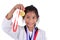 Asian taekwondo girl showing her gold meda