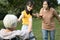 Asian teen granddaughter dissuade her family from a big fight,angry senior mother ,aggressive daughter arguing violently,abusing,