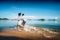 Asian teenage girl and boy running on the beach