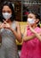 Asian Teenage Girls Wearing Medical Face Mask Making Stopping Signs Gesture with Their Hands