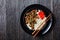 Asian teriyaki tofu with rice in a bowl, flat lay