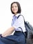 Asian Thai high schoolgirl student in school uniform isolated