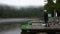 Asian thai woman travel and walking at Waterfront wooden bridge at Mummelsee lake