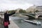 Asian thai woman travelers posing for take photo and travel at riverside of Seine river