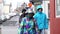 Asian tourist family with senior walking in downtown Iceland cold weather jacket
