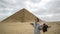 Asian tourist travel to Egypt Red Pyramid in saqqara architecture dream trip destination