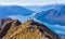 Asian tourists taking photo at Roy`s Peak Lake Wanaka New Zealand