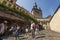 Asian tourists taking photos in Sighisoara medieval town, Romania