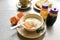 Asian traditional breakfast half boiled eggs, toast bread and co