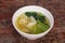 Asian traditional Wonton soup with herbs