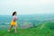 Asian trail runners, women  wearing sportswear are practicing on a high mountain running. During the evening when the air is fresh