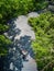 Asian traveler holiday relax with bicycle in nature park