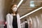 Asian travelers girl with medical face mask to protection the coronavirus in public areas