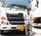 Asian a truck driver holding clipboard inspecting safety check a truck. vehicle maintenance checklist a truck.