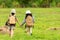 Asian two friend children holding hands and walking adventure, tourism for destination leisure trips for education relax in jungle