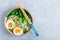 Asian Udon or Ramen noodles miso soup in bowl with Bok Choy and boiled egg