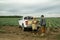 Asian Vegetable Farmer Talking To Customer