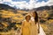 Asian Vietnamese bride with mother in traditional Vietnamese wedding dresses in the yellow autumn aspen trees of Colorado