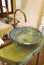 Asian vintage washbasin and chrome tap