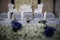 Asian wedding hall stage with white armchairs and sofa