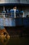 Asian woman in the abandoned giant ship in jungle on the Islands in the Gulf of Thailand posing for a photoshoot