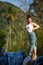 Asian woman in the abandoned giant ship in jungle on the Islands in the Gulf of Thailand posing for a photoshoot