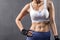 Asian Woman Abdominal with Six Pack Core Body Muscle Against Dark Background