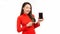 Asian woman in ao dai tranditional dressing pointing at empty smart phone