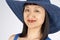 Asian Woman in Blue Straw Hat