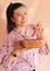 Asian woman with bowl of oat granola, healthy eating concept.