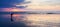 Asian woman catching saltwater fish on the beach at dusk