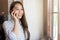 Asian woman cell phone call smile talking