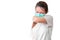 Asian woman coughing  in her elbow and wear medical protective face mask for protect infection the virus isolate on white