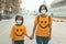 Asian woman and cute girl wearing respiratory mask or face mask or medicine mask to protect virus or  pollution.