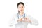 Asian woman doctor with stethoscope hand love heart gesture