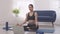Asian  woman does morning yoga, sitting in Easy position, Sukhasana posture, and meditating