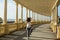 Asian woman does outdoor choreography on the atlantic promenade. Porto