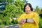 Asian woman with down syndrome smiling happy Fat young woman with down syndrome exercising in the park in the middle of nature