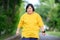 Asian woman with down syndrome smiling happy smiling and looking at camera Fat young woman with down syndrome exercising in the