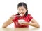 Asian woman eating rice