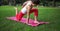 Asian woman exercising in a park