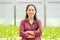 Asian woman farmer in vegetable hydroponic farm