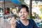 Asian woman and flower crab at Thai seafood market